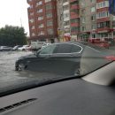 Всемирный потоп: после дождя тюменские улицы залило водой - фото, видео